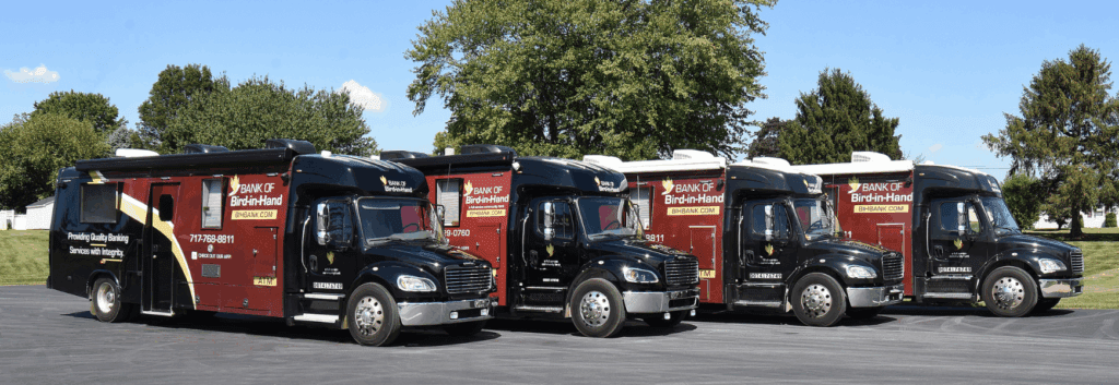 The buses of the GELT Bus mobile banking fleet